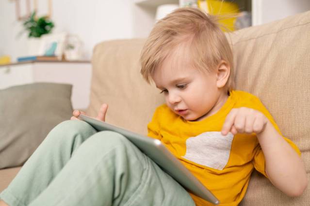 Child using Magrid learning program on his tablet