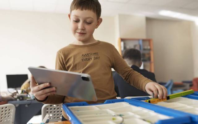 low tech, mid tech and aac device assisting people with autism using visual boards and sign language