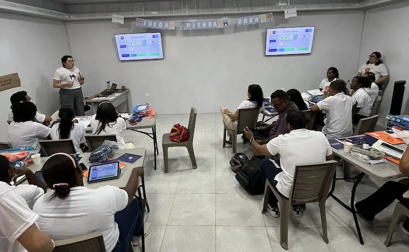 Magrid trainer leading an in-person special education training session with a group of educators in Latin America